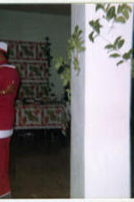 Dr. Copher attends the 1978 Christmas party in a Santa suit.