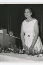 Josephine D. Murphy stands at a podium.