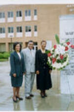 People celebrate at an Atlanta Student Movement 40th Anniversary event. Featured figure: Mary Ann Smith in front of Martin Luther King International Chapel and Hugh M. Gloster Hall.