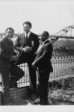 Southern Christian Leadership Conference President Joseph E. Lowery poses for a photo with Jesse Jackson and John Lewis in Selma, Alabama. The Edmund Pettus Bridge can be seen in the background.