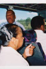 U.S. Representative John Lewis speaks to SCLC/W.O.M.E.N. Civil Rights Heritage Tour attendees on the bus.