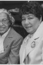 Rosa Parks and Evelyn G. Lowery pose for a photo during the proceedings of a Southern Christian Leadership Conference Spring Board meeting in Detroit, Michigan.
