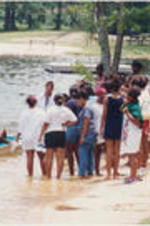A group of young girls stand by a lake during a SCLC/W.O.M.E.N. Bridging the Gap: Girls to Women Mentoring Program event.
