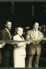 Maynard Jackson and others cut a ribbon honoring a building opening.