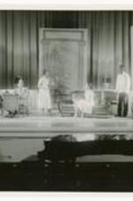 View of actors on stage. Written on verso: "Affairs of State" - produced at the Atlanta University Summer Theatre, July 22, 23, 24, 1954.