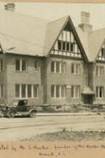 Exterior of Chadwick school with a car parked outside. Written on recto: Roof donated by Mr. S. Mueller, founder of the Mueller Macaroni Company, Newark, New Jersey.
