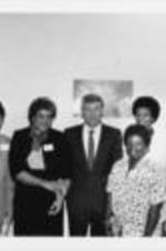 Vice President Dan Quayle poses for a photo with SCLC/WOMEN members (including founder and convener Evelyn G. Lowery, at left) during his tour of the SCLC/WOMEN Learning Center.