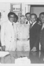 Southern Christian Leadership Conference (SCLC) President Joseph E. Lowery (second from left) is shown with his wife Evelyn and other members of the SCLC delegation that traveled to Lebanon as part of a peace mission. The SCLC delegation stand with Yasser Arafat (at center), the chairman of the Palestinian Liberation Organization.