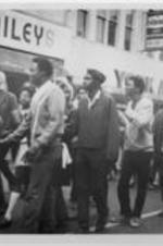LeMoyne-Owen College students are shown marching down South Main Street in Memphis, Tennessee.