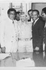 Southern Christian Leadership Conference (SCLC) President Joseph E. Lowery (second from left) is shown with his wife Evelyn and other members of the SCLC delegation that traveled to Lebanon as part of a peace mission. The SCLC delegation stand with Yasser Arafat (at center), the chairman of the Palestinian Liberation Organization. From left to right in the photo are Evelyn G. Lowery, Joseph E. Lowery, unidentified man, Yasser Arafat, C.T. Vivian, Walter E. Fauntroy, and Reverend Bernard Lee.