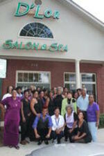 Evelyn G. Lowery (second row, third from right) poses for a photo with SCLC/W.O.M.E.N. members and others at a Pampering For Peace event held at D'Lor Salon &amp; Spa in Atlanta, Georgia in recognition of National Domestic Violence Awareness Month.