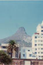 A photo of a mountain in Cape Town, South Africa with buildings in the foreground.