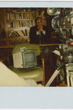 Joseph E. Lowery being recorded for an interview in front of a bookshelf. Written on verso: Frontline.