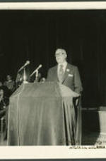 Unidentified man giving a speech during the 1974 "Henderson, We Love you Madly Day" Celebration.
