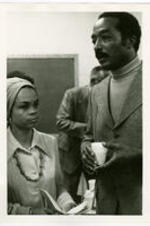 Sonia Sanchez and Hoyt Fuller at a gathering.