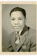 High school photograph of Gladstone "Mickey" Chandler, Jr. Written on verso: Mickey - as he graduated from Washington High as an accelerated student - a wartime measure hastening the procedure.