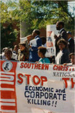 Southern Christian Leadership Conference (SCLC) President Joseph E. Lowery is shown speaking with a megaphone alongside Evelyn G. Lowery, Brenda Davenport, and others at an AT&amp;T protest.