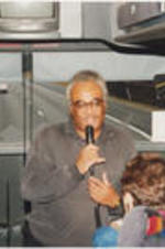 Tyrone Brooks addresses SCLC/W.O.M.E.N. Civil Rights Heritage Tour participants on the bus.