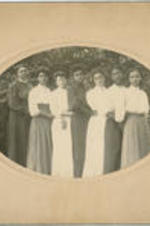 Portrait of unidentified women standing in a row.
