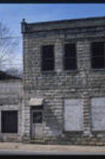 A building located in south Atlanta. Text from slide presentation: That and the general migration of many Blacks to Atlanta's west side during the 1930s and 1940s, led to the neighborhood's decline.