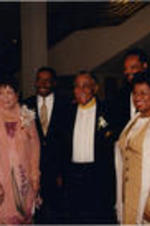 Joseph and Evelyn Lowery pose for a photo with others at the 20th Annual SCLC/W.O.M.E.N. Drum Major for Justice Awards dinner. From left to right: Hosea Williams, Evelyn G. Lowery, unidentified man, Joseph E. Lowery, Jesse Jackson, unidentified woman, and Andrew Young.