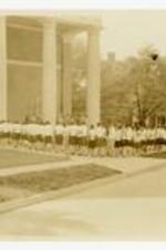 View of commencement procession of 1929. Written on verso: Sisters Chapel, Commencement 1929. Commencement Procession 1929.