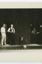 View of actors on stage; written on verso: 1939, "Smokey" by Thomas J. Pawley, Dr. Pawley (Ph.D. in Dramatic Art from the University of Iowa) was a member of the Summer Theatre Company. Atlanta University Summer Theatre.