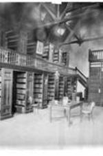 Interior of the library, showing the second floor of books.