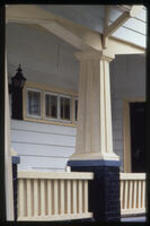 A close up view of a porch. Text from slide presentation: supported by tapered or square columns.