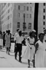 A group walks down the street in Atlanta.