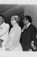 Joseph E. Lowery is shown speaking at a podium alongside Rosa Parks, Andrew Young, and Walter Fauntroy.