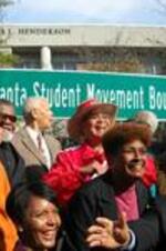 A group celebrates at the dedication of Atlanta Student Movement Boulevard.