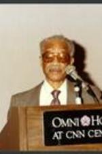 Dr. John Hope Franklin delivers his lecture from the podium.