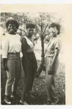 Group portrait of three women. Written on verso: "Morris Brown College; Miss Freshmount Court -1984-85; L to R- Savacia Wallace 2nd attendant, Vanessa Haygood- Miss Freshman, Trina Hodges 1st attendant".