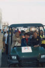 Joseph and Evelyn Lowery are shown riding in a golf cart down a street in Selma, Alabama during the Bridge Crossing Jubilee event.