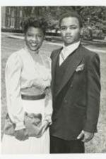 Outdoor portrait of a young man and woman.