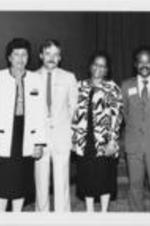 Evelyn G. Lowery and others are shown at the 1st National Conference on AIDS and the Black Community. For more details on the conference, see pages 42-45 of the August-September 1986 SCLC Magazine: http://hdl.handle.net/20.500.12322/auc.199:07030. Written on verso: Dr. Edgar Proctor, Pres., GA Medical Assoc., Mrs. Evelyn G. Lowery, Rev. Ken South, AID Atlanta, Sandra S. McDonald, Gil Gerald, Gil Robison.