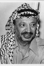 A photo of Yasser Arafat during his meeting with the Southern Christian Leadership Conference peace delegation.