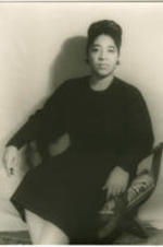 Portrait of Betty Allen sitting in a chair. Written on verso: Betty Allen; Photograph by Carl Van Vechten; 146 Central Park West; Cannot be reproduced without permission; March 27, 1958.