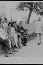 Students rest after the march to the state capitol. Left to right: Harold Middlebrooks, [unidentified], [unidentified], [unidentified], Ruby Doris Smith, Frank Holloway.