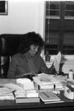 Vivian Malone Jones works behind her desk.