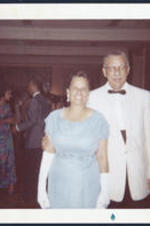 Dr. Brailsford R. Brazeal and wife Ernestine E. Brazeal dressed in coctail attire at an event. Written on verso: Mr. and Mrs. Brailsford Brazeal at party in Nashville, Tenn[essee] given by the Boule.