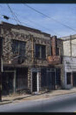 A storefront on Jonesboro road. Text from slide presentation: . . . and shopped in the stores on Jonesboro Road ...