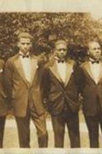 Brailsford R. Brazeal (second from left) poses with classmates wearing tuxedos at Morehouse College.
