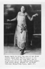 A portrait of Bessie Smith. Written on recto: Photo, 1923, by Edward Elcha, courtesy of Rudi Blesh. Bessie Smith in 1923, the year of her first record, which sold 780,000 copies in six months.  It earned her only $125, but it established her as the leading blues singer.  From BESSIE SMITH: EMPRESS OF THE BLUES (Schirmer Books/Frank Music, April 15).