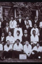 A group portrait of a geometry class. Text from slide presentation: time, money and energy to create a community where Blacks could receive an education and live in dignity.