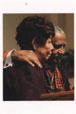 Joseph E. Lowery standing with his arm around Evelyn G. Lowery at a church alter.
