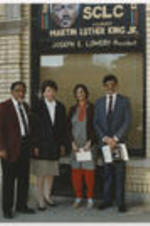 Joseph and Evelyn Lowery stand with Sunanda Gandhi and her husband, Aron Gandhi, outside the headquarters building for the Southern Christian Leadership Conference in Atlanta, Georgia. Aron Gandhi is the grandson of Mahatma Gandhi.