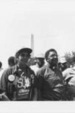Joseph and Evelyn Lowery are shown marching with a crowd of demonstrators past the Washington Monument during the Pilgrimage to Washington.