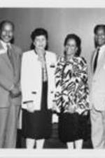 Evelyn G. Lowery and others are shown at the 1st National Conference on AIDS and the Black Community. For more details on the conference, see pages 42-45 of the August-September 1986 SCLC Magazine: http://hdl.handle.net/20.500.12322/auc.199:07030. Written on verso: Dr. Bernard Bridges, Dr. Louis Sullivan, Evelyn G. Lowery, Sandra S. McDonald, Dr. Donald Hopkins, Dr. Thomas Vernon